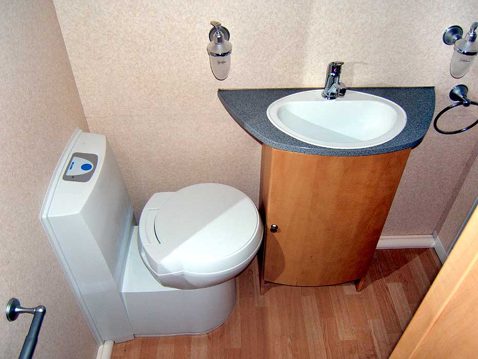 The cassette toilet and washbasin.